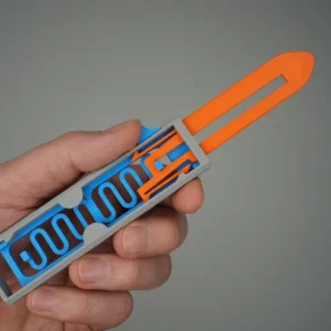 ForgeFi Flip Knife held in a hand, a blunt printed flip knife with a sliding blade and an exposed track mechanism
